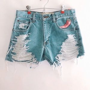 Painted high waisted jean shorts.